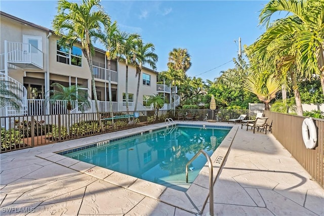 view of pool featuring a patio area