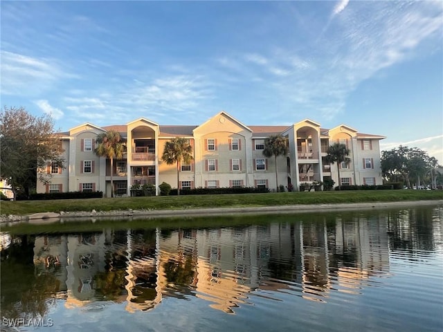 view of property with a water view