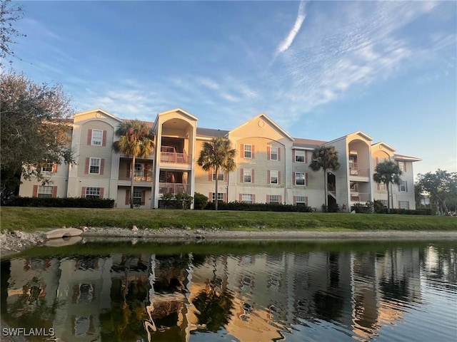 view of property with a water view