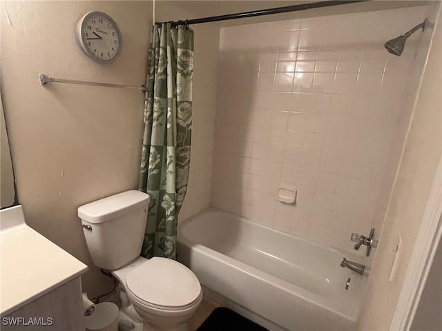 bathroom featuring vanity, toilet, and shower / tub combo with curtain