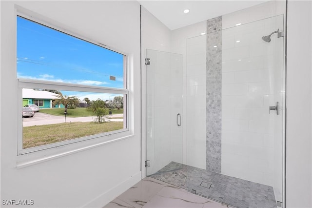 bathroom with an enclosed shower