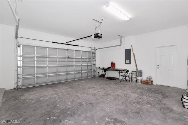 garage with a garage door opener and electric panel