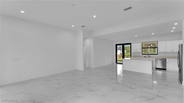 interior space with sink and french doors