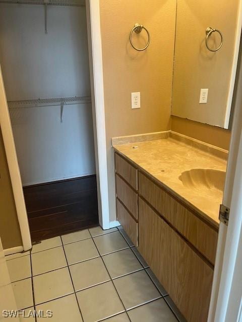 bathroom featuring vanity and tile patterned flooring