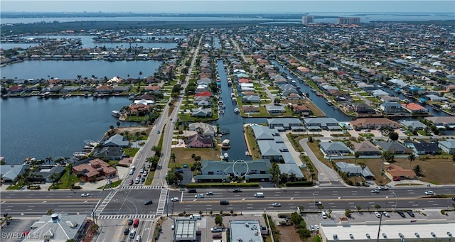 808 Cape Coral Pkwy W Unit 204, Cape Coral, FL 33914 - birds eye view of property with a water view and a residential view