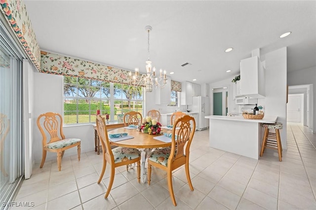 dining space with an inviting chandelier, recessed lighting, visible vents, and light tile patterned flooring