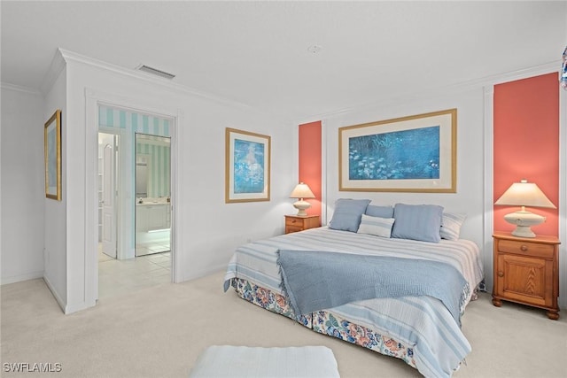 bedroom featuring light carpet, baseboards, visible vents, connected bathroom, and ornamental molding