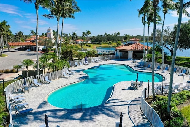 pool with fence, a gazebo, and a patio