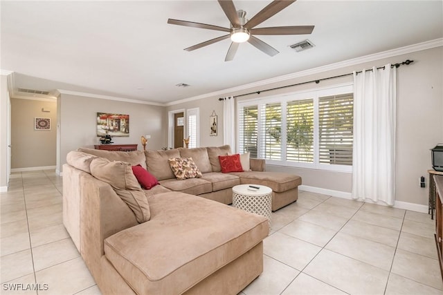 living room with ornamental molding, light tile patterned floors, and ceiling fan