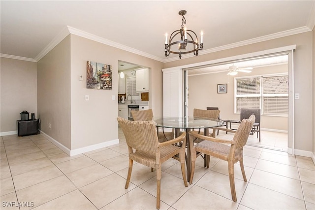 tiled dining room featuring crown molding, sink, and ceiling fan with notable chandelier