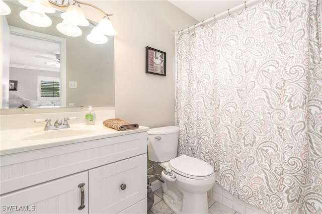 bathroom featuring crown molding, ceiling fan, tile patterned flooring, vanity, and toilet