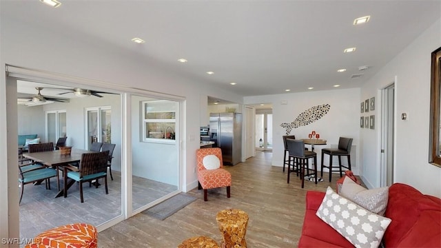 living room with light hardwood / wood-style flooring