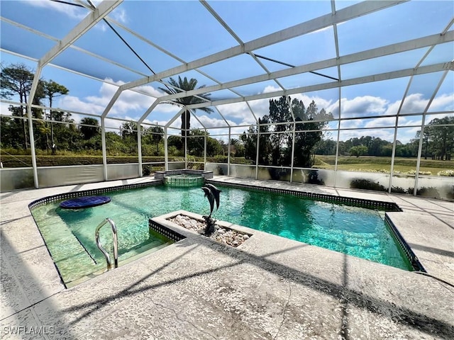 view of pool featuring a patio, a lanai, and a pool with connected hot tub