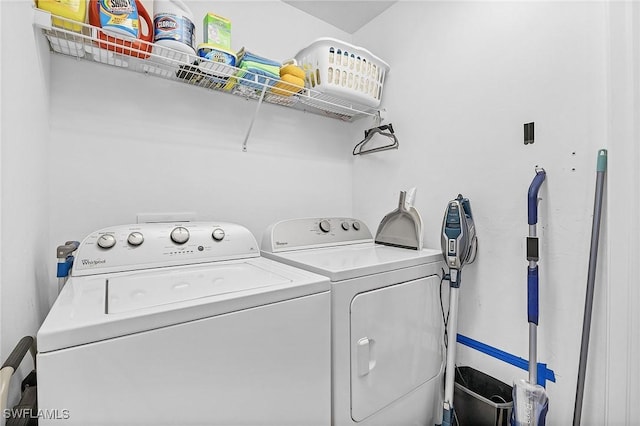 laundry room with washer and clothes dryer