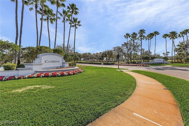 view of home's community featuring a yard