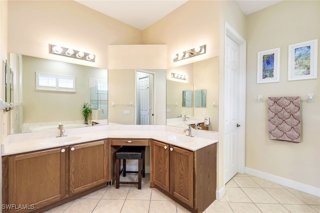 bathroom with tile patterned flooring and vanity