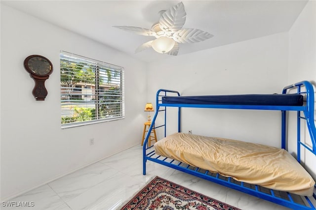 bedroom featuring ceiling fan