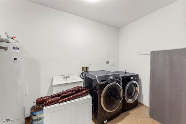 washroom featuring sink and washing machine and dryer