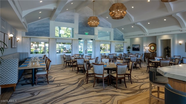 dining space with beamed ceiling, recessed lighting, high vaulted ceiling, and visible vents