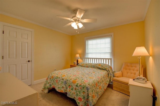 bedroom featuring light carpet, ornamental molding, and ceiling fan