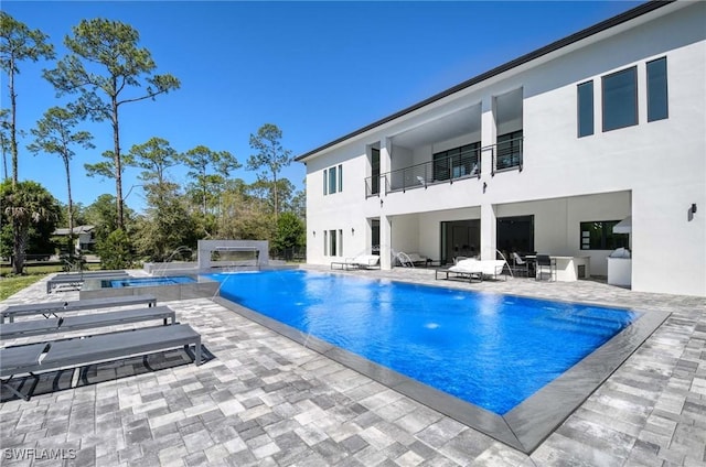 outdoor pool with a patio