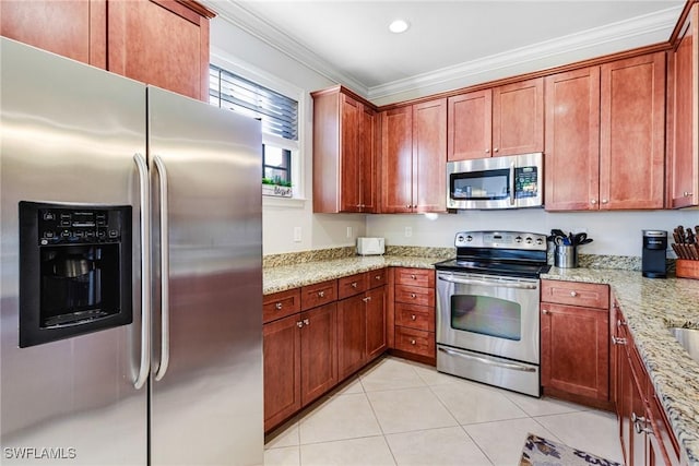 kitchen featuring crown molding, appliances with stainless steel finishes, light tile patterned flooring, and light stone counters