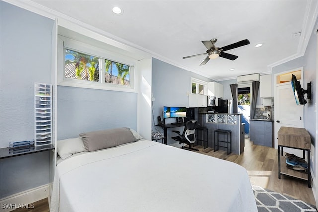 646 111th Ave N, Naples, FL 34108 - bedroom featuring light wood-type flooring, crown molding, recessed lighting, and ceiling fan