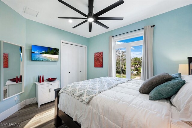 646 111th Ave N, Naples, FL 34108 - bedroom with wood finished floors, a closet, a ceiling fan, and recessed lighting
