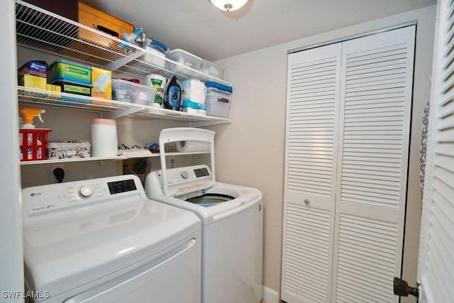 laundry room with separate washer and dryer