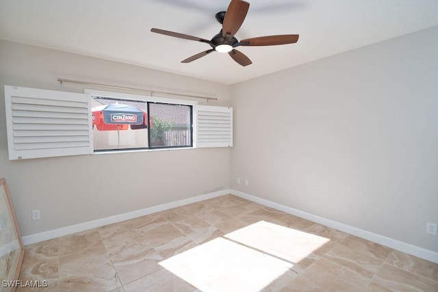 unfurnished room with ceiling fan