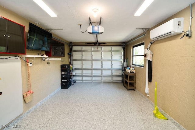 garage featuring a wall mounted air conditioner and a garage door opener