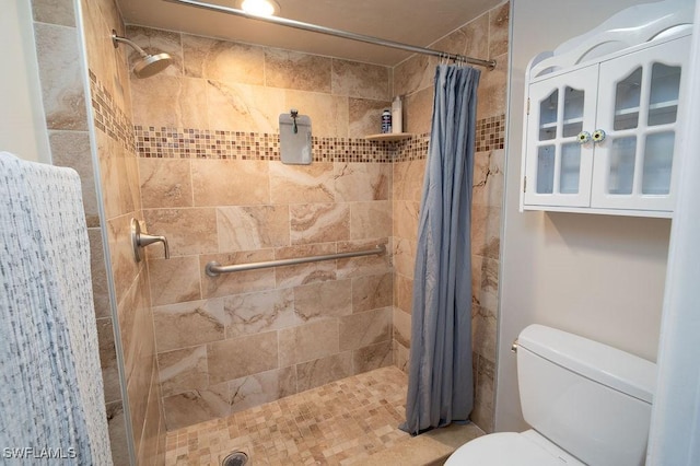 bathroom with walk in shower and toilet