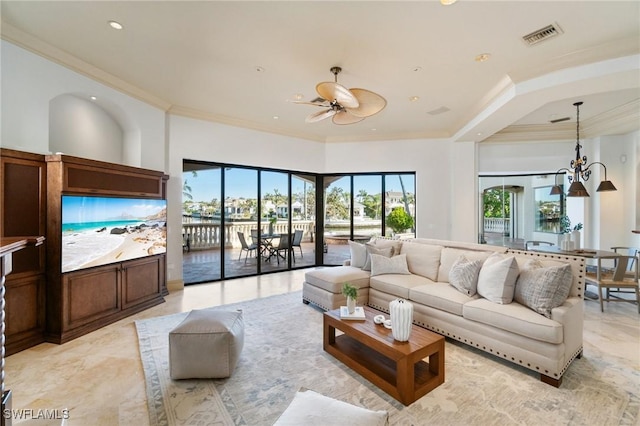 living room featuring recessed lighting, visible vents, crown molding, and ceiling fan with notable chandelier