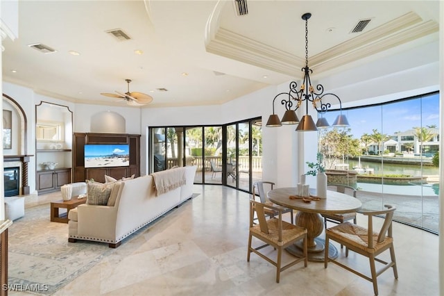 interior space featuring a raised ceiling and visible vents