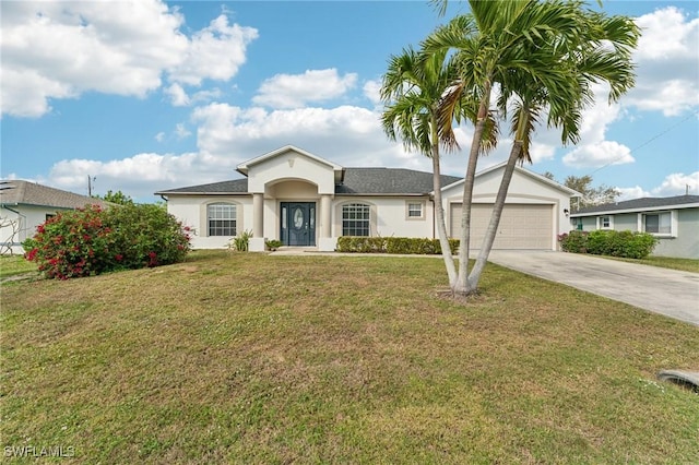 view of front of home with a garage and a front lawn