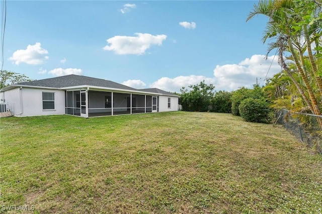 view of yard featuring a sunroom