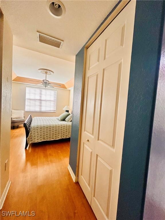 bedroom with hardwood / wood-style floors