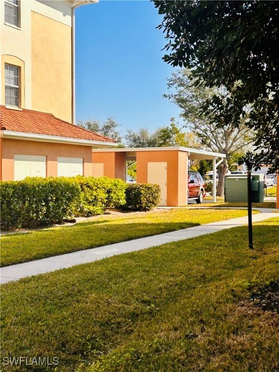 view of yard featuring a carport