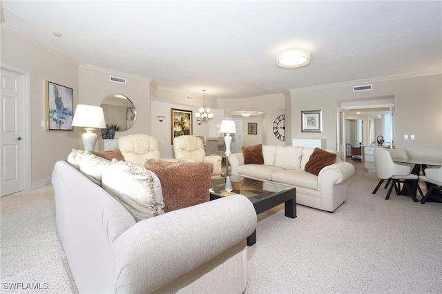 living room featuring a notable chandelier, ornamental molding, and light colored carpet