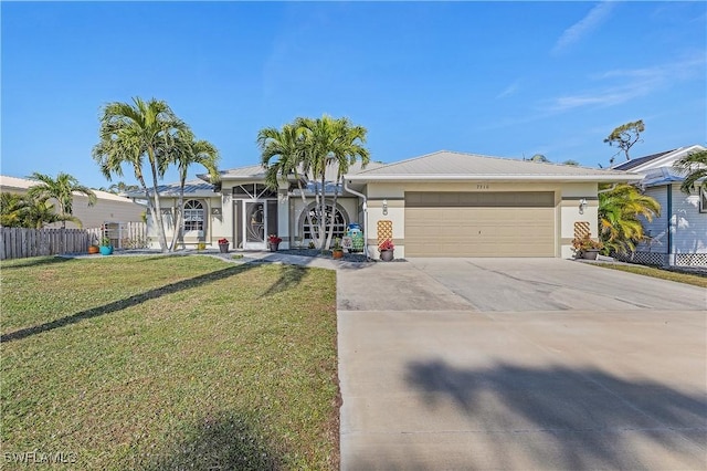 ranch-style house featuring a garage and a front lawn