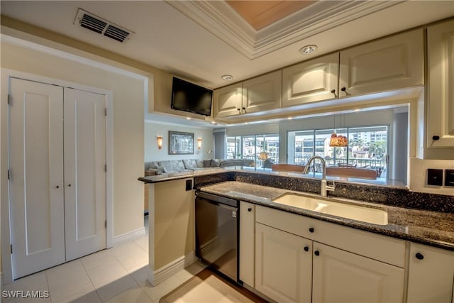 kitchen with light tile patterned floors, sink, crown molding, dishwasher, and dark stone counters