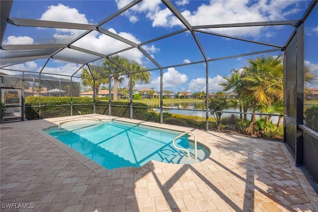 outdoor pool featuring a patio, a water view, and glass enclosure