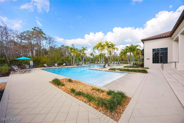 pool featuring a patio