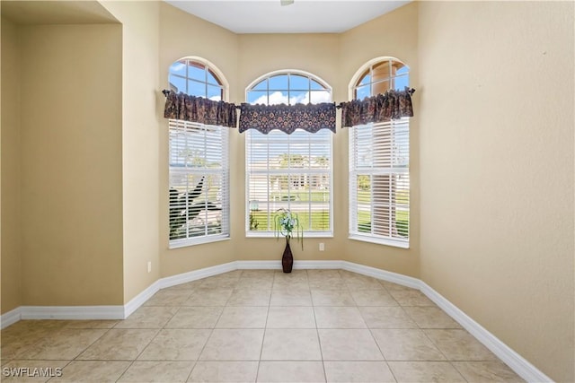 empty room with light tile patterned flooring