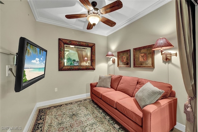 living room featuring ornamental molding and ceiling fan