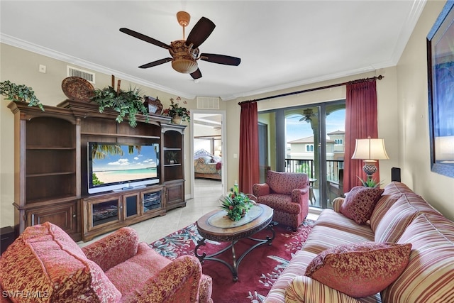 tiled living room with crown molding and ceiling fan