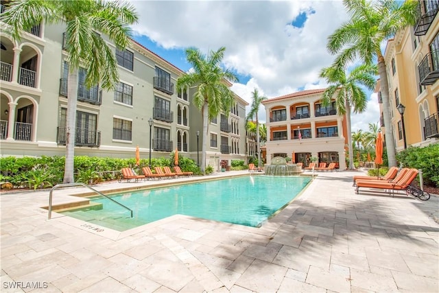 view of pool featuring a patio