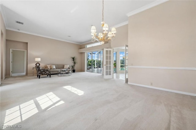 empty room featuring a high ceiling, light colored carpet, a notable chandelier, crown molding, and french doors