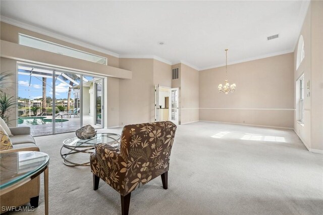 carpeted living room with crown molding and a notable chandelier