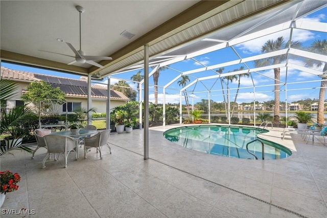 view of pool with a lanai and a patio